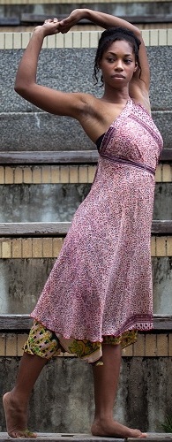 Image of fashion model in purple dress.