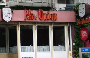 Front window and sign of Mr. Onion restaurant.