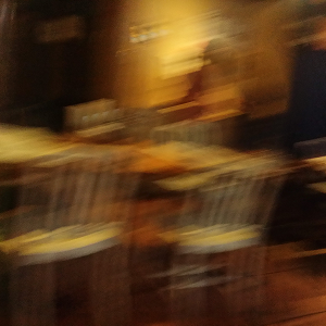 Blurry photo of the inside of a restaurant.